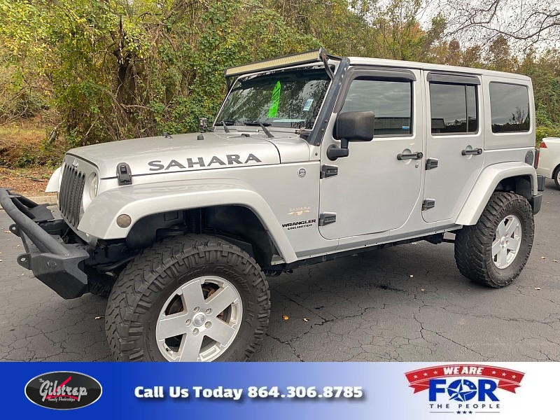 Used 2012  Jeep Wrangler Unlimited 4d Convertible Sahara at The Gilstrap Family Dealerships near Easley, SC