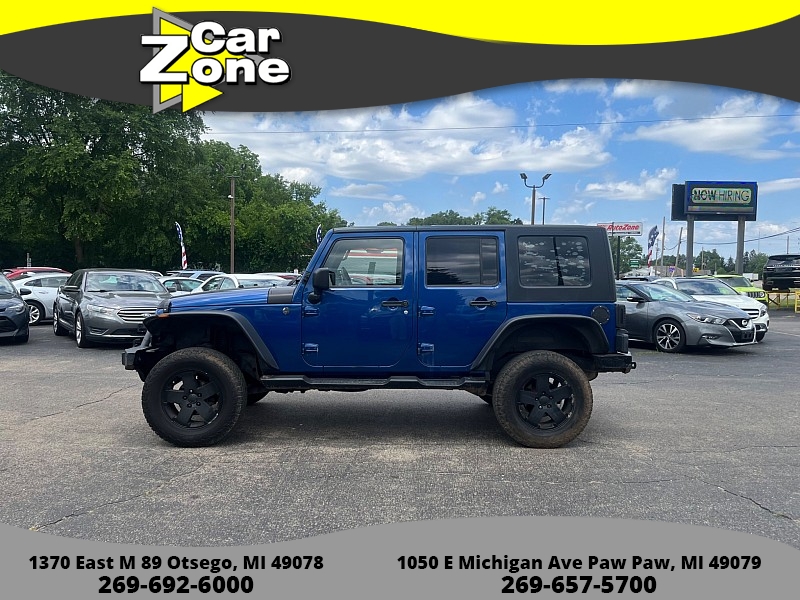 Used 2009  Jeep Wrangler Unlimited 4d Convertible 4WD X at Car Zone Sales near Otsego, MI