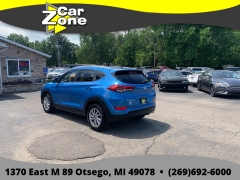 Used 2016  Hyundai Tucson 4d SUV AWD SE Popular at Car Zone Sales near Otsego&comma; MI