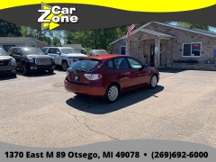 Used 2011  Subaru Impreza 4d Hatchback i Premium Auto at Car Zone Sales near Otsego&comma; MI