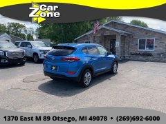 Used 2016  Hyundai Tucson 4d SUV AWD SE Popular at Car Zone Sales near Otsego&comma; MI
