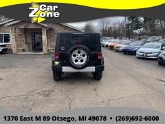 Used 2015  Jeep Wrangler Unlimited 4d Convertible Sahara at Car Zone Sales near Otsego&comma; MI