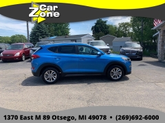 Used 2016  Hyundai Tucson 4d SUV AWD SE Popular at Car Zone Sales near Otsego&comma; MI