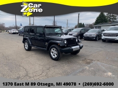 Used 2015  Jeep Wrangler Unlimited 4d Convertible Sahara at Car Zone Sales near Otsego&comma; MI