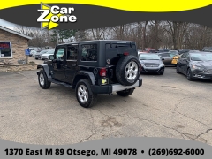 Used 2015  Jeep Wrangler Unlimited 4d Convertible Sahara at Car Zone Sales near Otsego&comma; MI