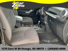 Used 2015  Jeep Wrangler Unlimited 4d Convertible Sahara at Car Zone Sales near Otsego&comma; MI