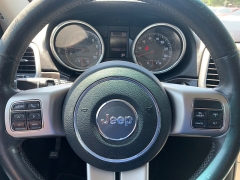 Used 2012 Jeep Grand Cherokee 4d SUV 4WD Laredo at Car Zone Sales near Otsego, MI