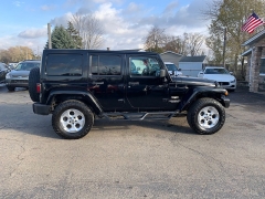 Used 2014  Jeep Wrangler Unlimited 4d Convertible Sahara at Car Zone Sales near Otsego, MI