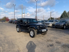 Used 2014  Jeep Wrangler Unlimited 4d Convertible Sahara at Car Zone Sales near Otsego, MI
