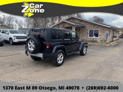 Used 2015  Jeep Wrangler Unlimited 4d Convertible Sahara at Car Zone Sales near Otsego&comma; MI
