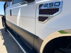 Used 2009 Ford Super Duty F-250 4WD Crew Cab XLT at Rooster Auto Sales near Vinton, IA