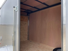 New 2025 Haul About Bobcat Enclosed 6x12 Trailer at Rooster Auto Sales near Vinton, IA