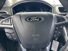 Used 2015  Ford Fusion 4d Sedan SE 1.5L EcoBoost at Rooster Auto Sales near Vinton, IA