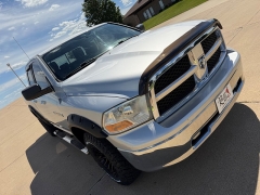 Used 2011  Ram 1500 4WD Quad Cab SLT at Rooster Auto Sales near Vinton&comma; IA