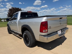 Used 2011  Ram 1500 4WD Quad Cab SLT at Rooster Auto Sales near Vinton&comma; IA