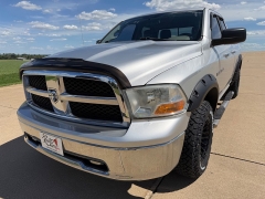 Used 2011  Ram 1500 4WD Quad Cab SLT at Rooster Auto Sales near Vinton&comma; IA