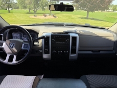 Used 2011  Ram 1500 4WD Quad Cab SLT at Rooster Auto Sales near Vinton&comma; IA