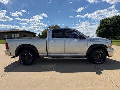 Used 2011  Ram 1500 4WD Quad Cab SLT at Rooster Auto Sales near Vinton&comma; IA