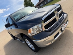 Used 2016  Ram 1500 4WD Quad Cab SLT at Rooster Auto Sales near Vinton&comma; IA