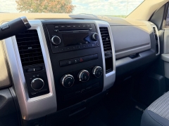 Used 2011  Ram 1500 4WD Quad Cab SLT at Rooster Auto Sales near Vinton&comma; IA