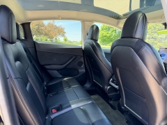 Used 2021  Tesla Model Y Long Range AWD at Rooster Auto Sales near Vinton&comma; IA
