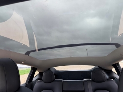 Used 2021  Tesla Model Y Long Range AWD at Rooster Auto Sales near Vinton&comma; IA