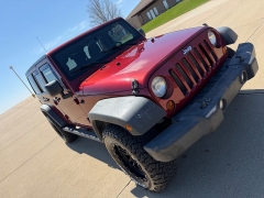 Used 2011  Jeep Wrangler Unlimited 4d Convertible Sport at Rooster Auto Sales near Vinton&comma; IA