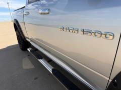 Used 2011  Ram 1500 4WD Quad Cab SLT at Rooster Auto Sales near Vinton&comma; IA