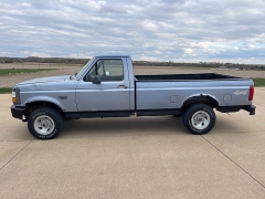 Used 1996  Ford F-150 4WD Reg Cab XLT at Rooster Auto Sales near Vinton, IA