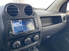 Used 2012  Jeep Compass 4d SUV 4WD Limited at Rooster Auto Sales near Vinton, IA