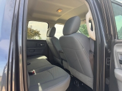 Used 2016  Ram 1500 4WD Quad Cab SLT at Rooster Auto Sales near Vinton&comma; IA