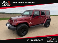 Used 2013  Jeep Wrangler Unlimited 4d Convertible Sahara at Rooster Auto Sales near Vinton&comma; IA