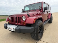 Used 2013  Jeep Wrangler Unlimited 4d Convertible Sahara at Rooster Auto Sales near Vinton&comma; IA