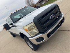 Used 2014  Ford Super Duty F-250 4WD Crew Cab XLT Longbed at Rooster Auto Sales near Vinton, IA