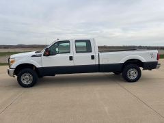 Used 2014  Ford Super Duty F-250 4WD Crew Cab XLT Longbed at Rooster Auto Sales near Vinton, IA