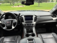 Used 2017  GMC Yukon 4d SUV 4WD SLT at Rooster Auto Sales near Vinton&comma; IA