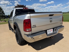 Used 2011  Ram 1500 4WD Quad Cab SLT at Rooster Auto Sales near Vinton&comma; IA