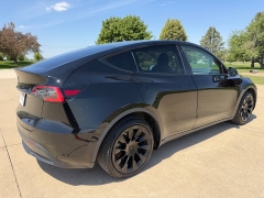 Used 2021  Tesla Model Y Long Range AWD at Rooster Auto Sales near Vinton&comma; IA