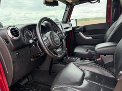 Used 2013  Jeep Wrangler Unlimited 4d Convertible Sahara at Rooster Auto Sales near Vinton&comma; IA