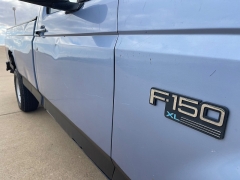 Used 1996  Ford F-150 4WD Reg Cab XLT at Rooster Auto Sales near Vinton, IA