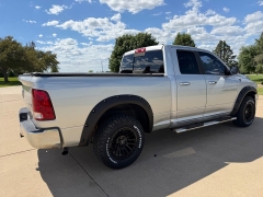 Used 2011  Ram 1500 4WD Quad Cab SLT at Rooster Auto Sales near Vinton&comma; IA