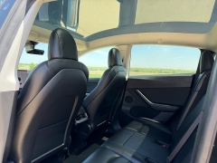 Used 2021  Tesla Model Y Long Range AWD at Rooster Auto Sales near Vinton&comma; IA