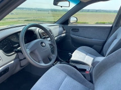 Used 2004 Kia Optima 4d Sedan LX MT at Rooster Auto Sales near Vinton, IA