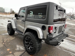 Used 2013  Jeep Wrangler 4WD 2dr Sahara at VerHage Auto Sales near Holland, MI