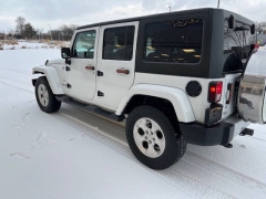 Used 2014  Jeep Wrangler Unlimited 4WD 4dr Sahara at VerHage Auto Sales near Holland&comma; MI