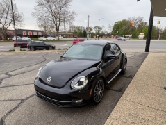 Used 2013 Volkswagen Beetle Coupe 2dr DSG 2.0T Turbo w/Sun/Snd/Nav PZEV *Ltd Avail* at VerHage Auto Sales near Holland, MI