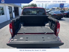 Used 2015 Nissan Frontier 2WD Crew Cab SWB at Victory Auto Store near Stuart, FL