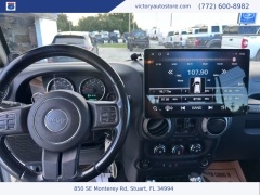Used 2014 Jeep Wrangler Unlimited 4WD 4dr Sport at Victory Auto Store near Stuart, FL