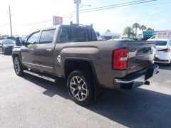 Used 2015 GMC Sierra 1500 4WD Crew Cab SLT at Victory Auto Store near Stuart, FL