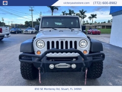 Used 2014 Jeep Wrangler Unlimited 4WD 4dr Sport at Victory Auto Store near Stuart, FL